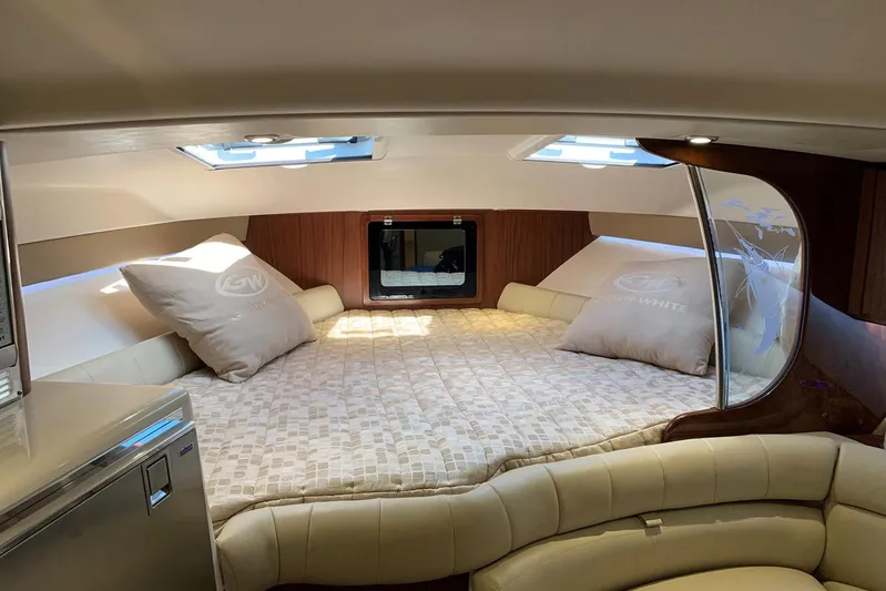  Yacht Photos Pics Luxurious cabin interior of 2015 Grady-White Express 370 with plush bedding and elegant design.
