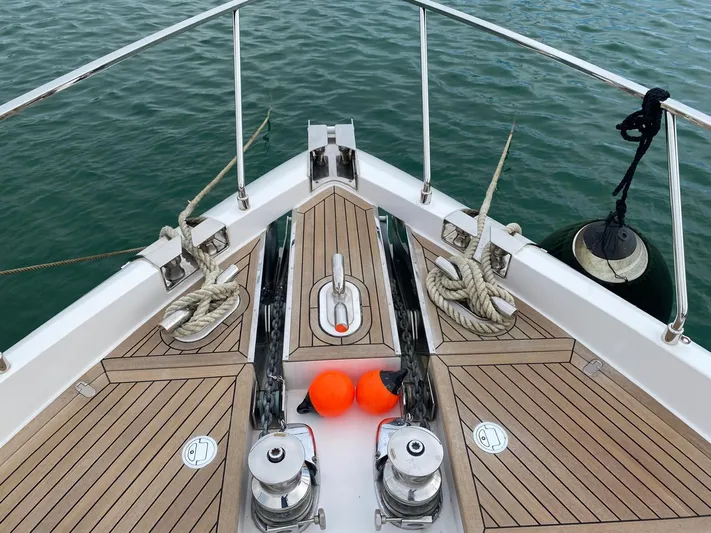 Kayra 1 Yacht Photos Pics Bow of 2024 Ferretti Yachts 780 with teak decking and mooring equipment.