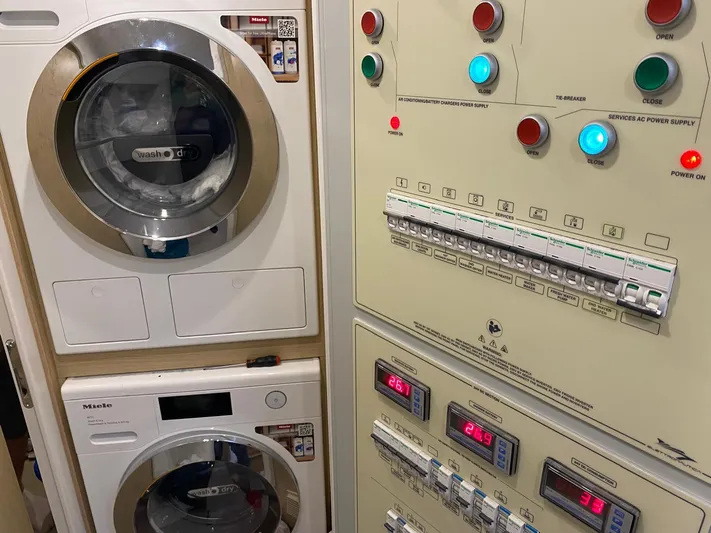 Kayra 1 Yacht Photos Pics Laundry and control panel area on a 2024 Ferretti Yachts 780.