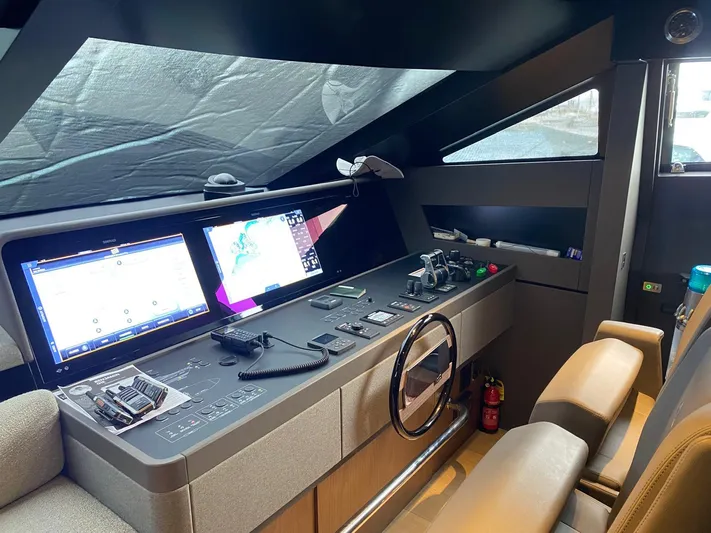Kayra 1 Yacht Photos Pics Helm of 2024 Ferretti Yachts 780 with modern navigation equipment and controls.