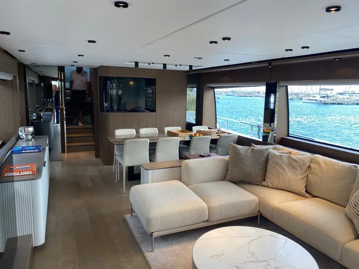 Kayra 1 Yacht Photos Pics Luxurious interior of 2024 Ferretti Yachts 780 with elegant seating and ocean view.