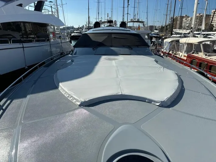  Yacht Photos Pics 2005 Baia Atlantica 78 yacht docked in a marina, showcasing sleek design and luxury features.