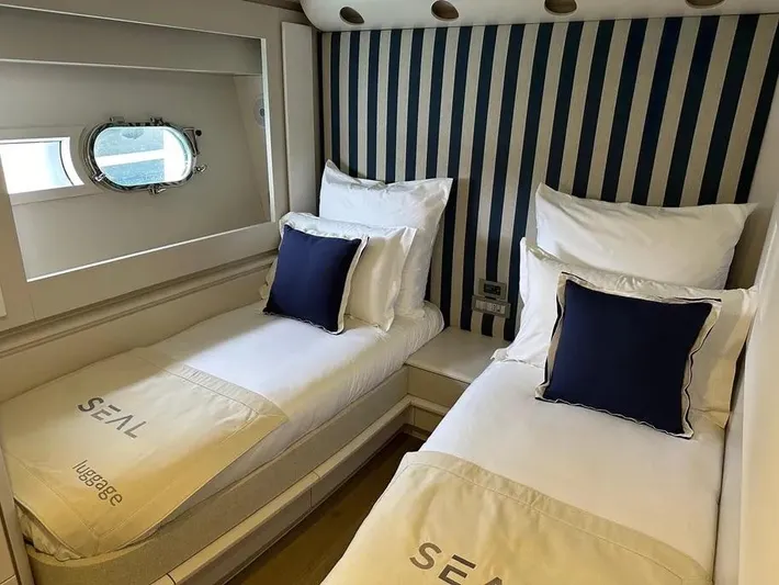  Yacht Photos Pics Twin cabin with striped walls in 2005 Baia Atlantica 78 yacht.