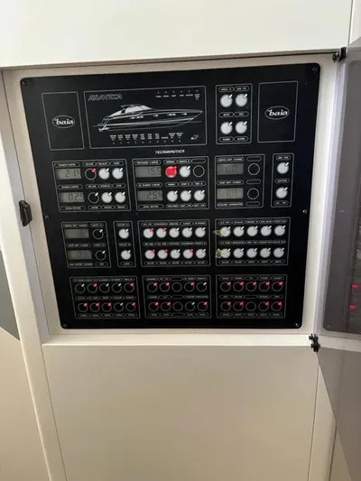  Yacht Photos Pics Control panel of a 2005 Baia Atlantica 78 yacht, featuring various switches and dials.