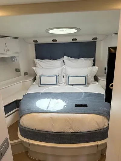  Yacht Photos Pics Luxurious bedroom interior of 2005 Baia Atlantica 78 yacht with elegant bedding.