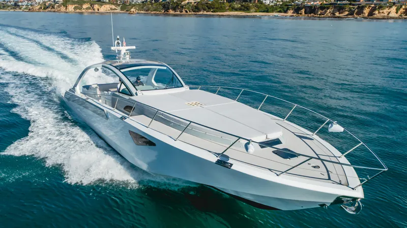 Catch And Release Yacht Photos Pics 2017 Triton Custom yacht cruising on open water, showcasing sleek design and luxury.