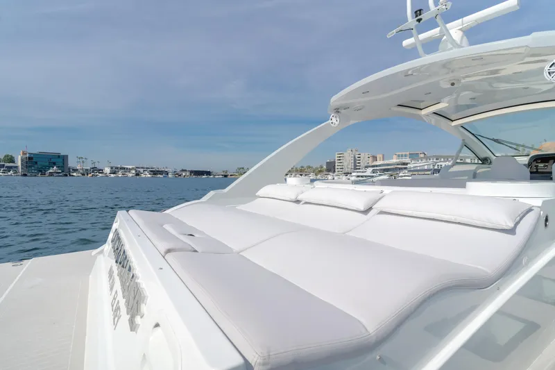 Catch And Release Yacht Photos Pics Luxurious 2017 Triton Custom yacht with spacious sun deck, overlooking serene waterfront.