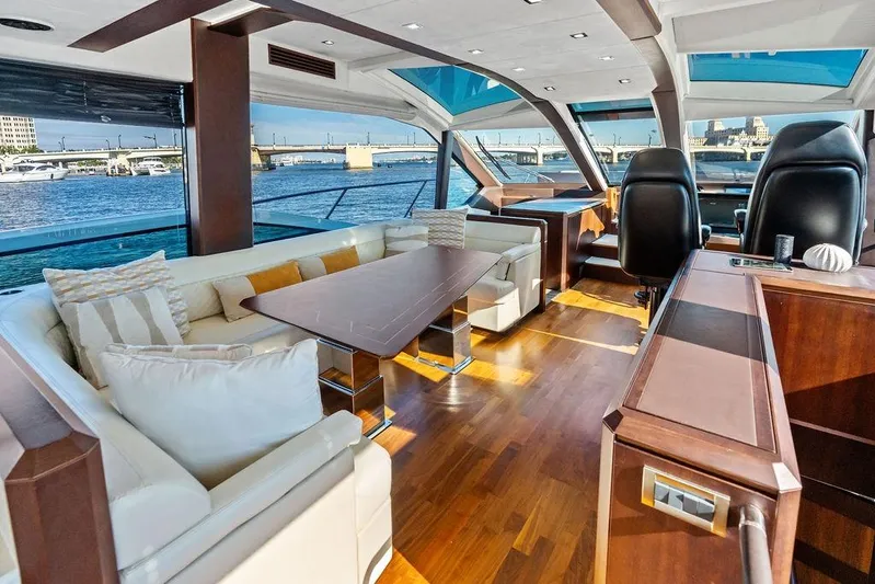  Yacht Photos Pics Luxurious interior of 2018 Galeon 640 Fly yacht with elegant seating and panoramic windows.
