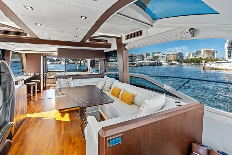  Yacht Photos Pics Luxurious interior of 2018 Galeon 640 Fly yacht with waterfront view.