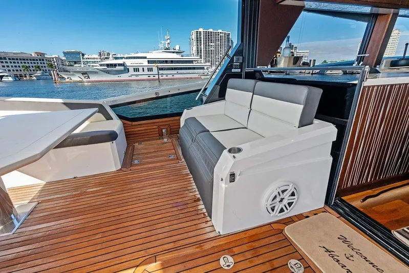  Yacht Photos Pics Luxurious 2018 Galeon 640 Fly yacht deck with seating and waterfront view.