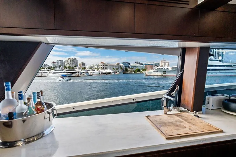  Yacht Photos Pics Luxurious view from 2018 Galeon 640 Fly yacht's kitchen, overlooking marina and cityscape.