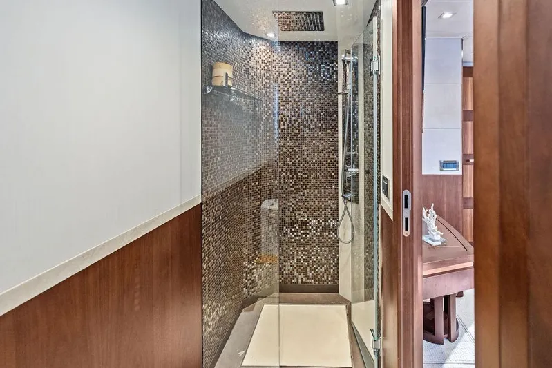  Yacht Photos Pics Luxurious bathroom with mosaic-tiled shower in 2018 Galeon 640 Fly yacht.