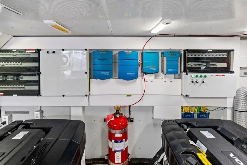  Yacht Photos Pics Engine room of 2018 Galeon 640 Fly yacht with electrical panels and fire extinguisher.