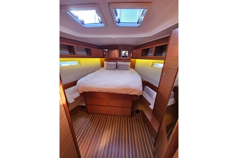 Send Me Yacht Photos Pics Luxurious cabin interior of 2018 Dufour 460 Grand Large yacht with skylights and wood finish.