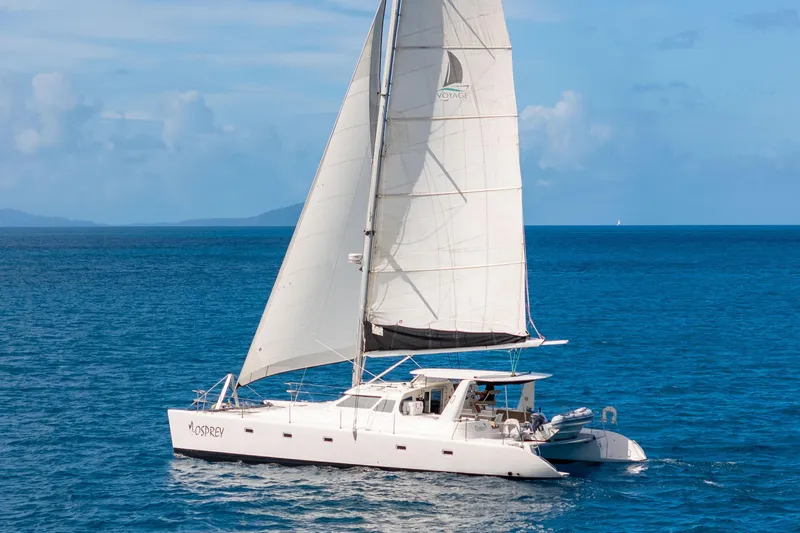 Osprey Yacht Photos Pics Sailing catamaran Voyage 520, 2010 model, cruising on open blue sea.