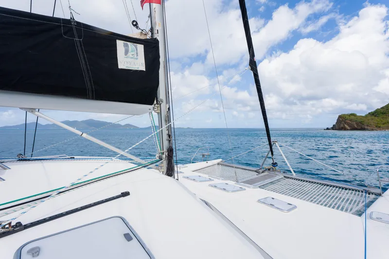 Osprey Yacht Photos Pics Sailing catamaran Voyage 520, 2010 model, cruising in clear blue ocean waters.