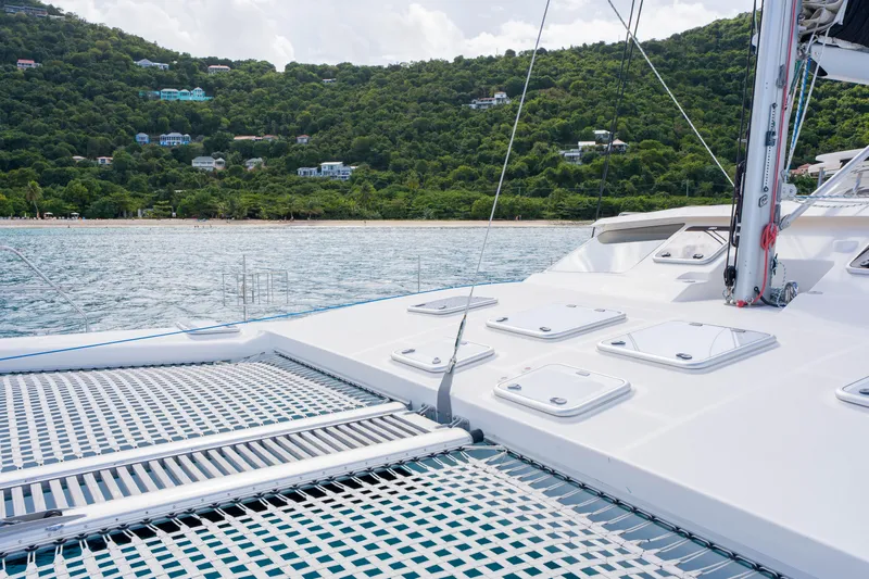 Osprey Yacht Photos Pics Catamaran deck of 2010 Voyage 520 with scenic coastal view.