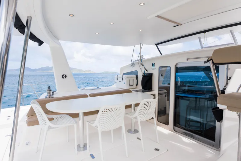 Osprey Yacht Photos Pics Spacious deck of 2010 Voyage 520 yacht with ocean view and seating area.