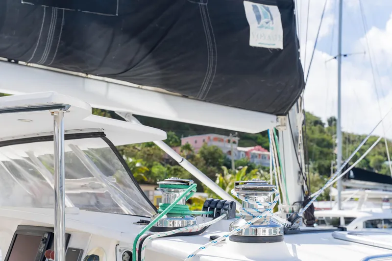 Osprey Yacht Photos Pics Close-up of 2010 Voyage 520 sailboat deck with winch and ropes.