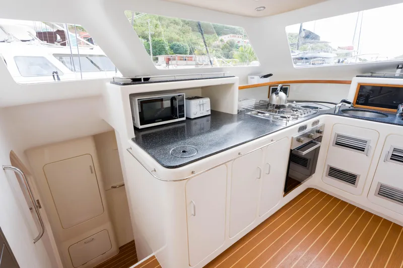 Osprey Yacht Photos Pics Modern kitchen interior on 2010 Voyage 520 yacht with appliances and sleek design.