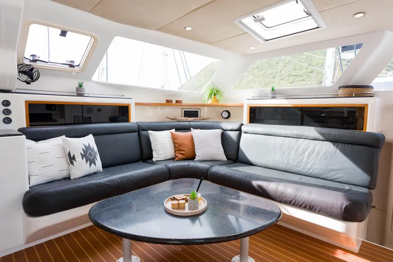 Osprey Yacht Photos Pics Luxurious interior of 2010 Voyage 520 yacht with modern seating and decor.