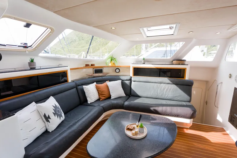 Osprey Yacht Photos Pics Luxurious interior of 2010 Voyage 520 yacht with modern seating and decor.