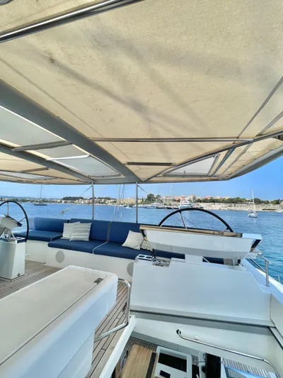  Yacht Photos Pics Luxurious 2018 Lagoon 620 yacht interior with spacious seating and scenic ocean view.