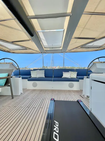  Yacht Photos Pics 2018 Lagoon 620 yacht deck with seating, modern design, and open canopy.