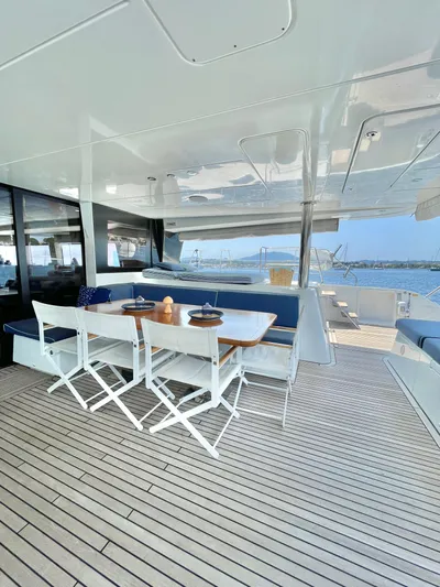  Yacht Photos Pics Spacious deck of 2018 Lagoon 620 yacht with dining area and ocean view.