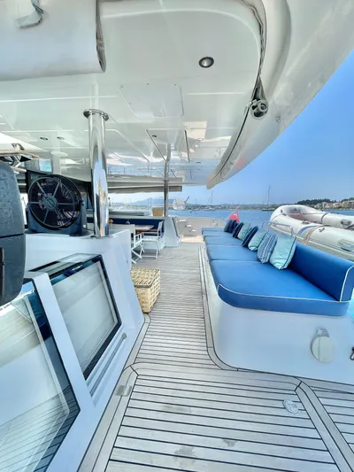  Yacht Photos Pics Luxurious 2018 Lagoon 620 yacht deck with blue cushioned seating and ocean view.
