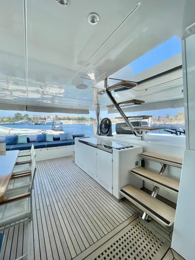  Yacht Photos Pics Luxurious 2018 Lagoon 620 yacht interior with modern seating and sleek design.