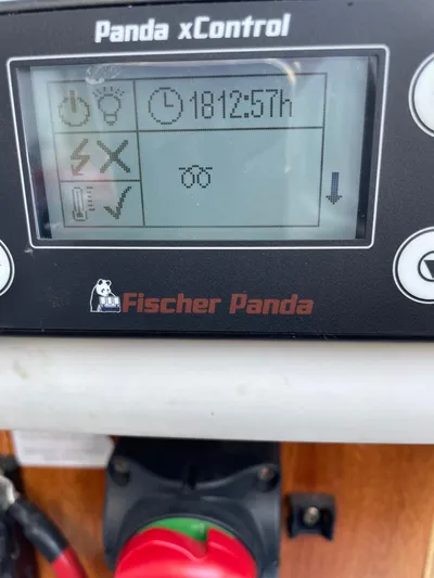  Yacht Photos Pics Fischer Panda xControl display on Lagoon 620, 2018 model, showing operational hours.