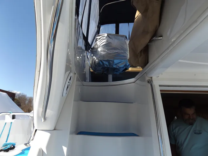  Yacht Photos Pics 2003 Carver 360 Sport Sedan boat stairs leading to upper deck.