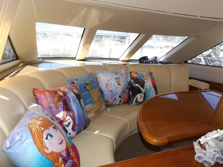  Yacht Photos Pics Interior of 2003 Carver 360 Sport Sedan with themed cushions on a leather sofa.