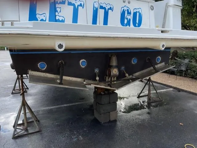  Yacht Photos Pics 2003 Carver 360 Sport Sedan on stands, rear view with "Let It Go" text.