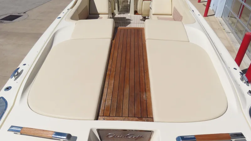  Yacht Photos Pics 2018 Chris-Craft Launch 34 boat with teak deck and beige seating.