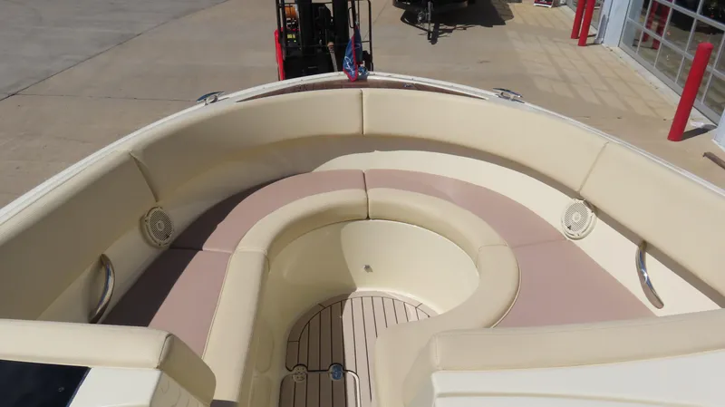  Yacht Photos Pics 2018 Chris-Craft Launch 34 boat interior with beige seating and wood flooring.