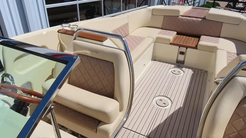  Yacht Photos Pics 2018 Chris-Craft Launch 34 interior with luxurious seating and elegant wood accents.