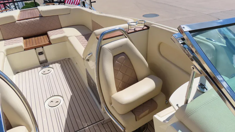  Yacht Photos Pics 2018 Chris-Craft Launch 34 interior with beige seating and wood accents.