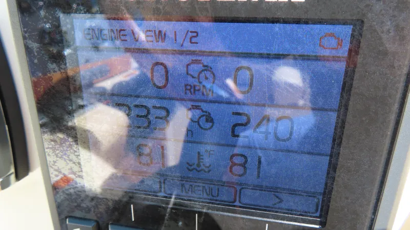  Yacht Photos Pics Close-up of a 2018 Chris-Craft Launch 34 engine display showing RPM and temperature.