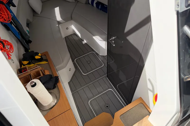  Yacht Photos Pics 2023 Schaefer V33 cabin interior with modern design and practical storage solutions.