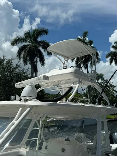 T-party Yacht Photos Pics 2012 Everglades LX 350 boat with radar, palm trees in background.
