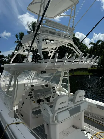 T-party Yacht Photos Pics 2012 Everglades LX 350 boat with dual helm seats and fishing rod holders.