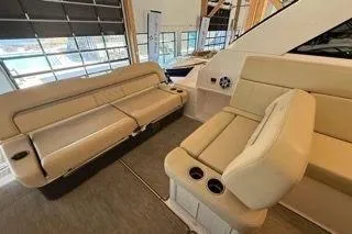 Social Distance Yacht Photos Pics 2019 Regal 35 Sport Coupe interior with beige seating and modern design.