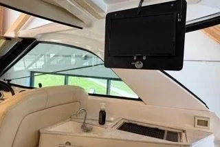 Social Distance Yacht Photos Pics Interior of 2019 Regal 35 Sport Coupe with TV and kitchenette.