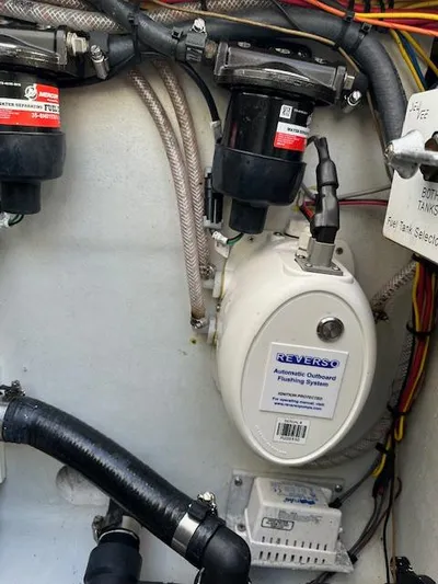  Yacht Photos Pics Engine compartment of 2023 SeaVee 370z with Reverso outboard flushing system and fuel filters.