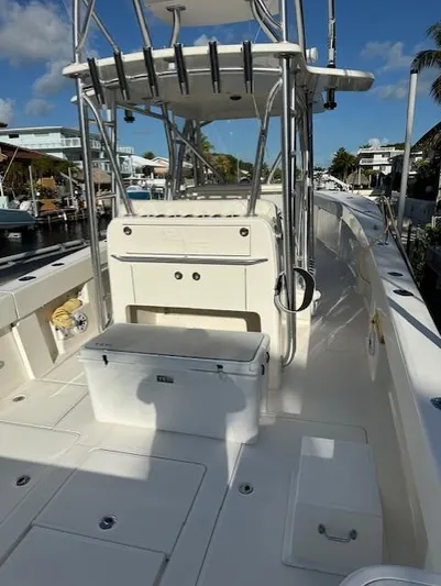  Yacht Photos Pics 2023 SeaVee 370z boat with spacious deck and fishing rod holders.