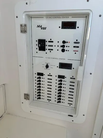  Yacht Photos Pics Control panel of 2023 SeaVee 370z boat, featuring 120 VAC and 12 VDC systems.