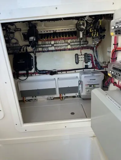  Yacht Photos Pics Electrical panel inside 2023 SeaVee 370z boat, showcasing wiring and components.