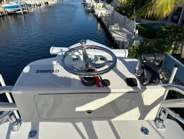  Yacht Photos Pics 2023 SeaVee 370z boat helm with Simrad system, dockside view.